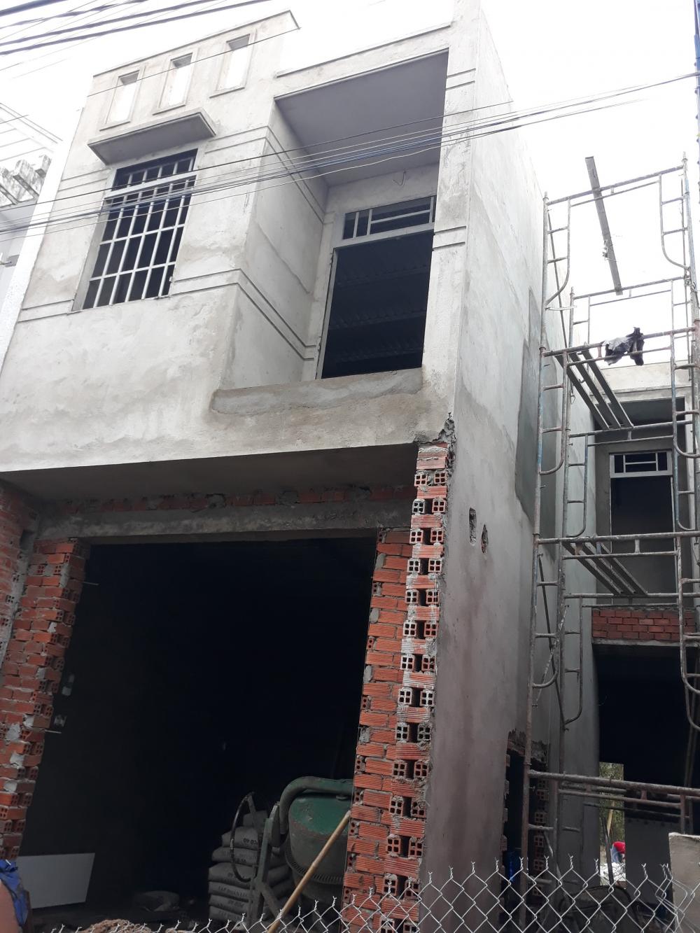 Bán nhà trệt, lầu tái định cư Tân Phước, DTSD: 137,8m2, bao hoàn công 9464961