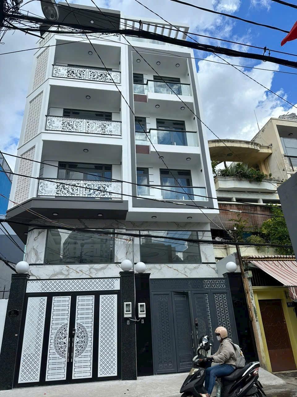 BÁN NHÀ MẶT TIỀN  ( 4.1m x 14.5m ) + 5 LẦU THANG MÁY + GẦN ĐH CÔNG NGHIỆP 15983952