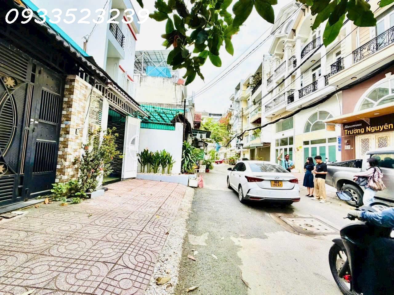 Bán nhà HXH 5m Dương Quảng Hàm, P5, GV. DT: 5x20m CN 100m2 Trệt 2 lầu. Giá: 9.9 tỷ TL 15984367