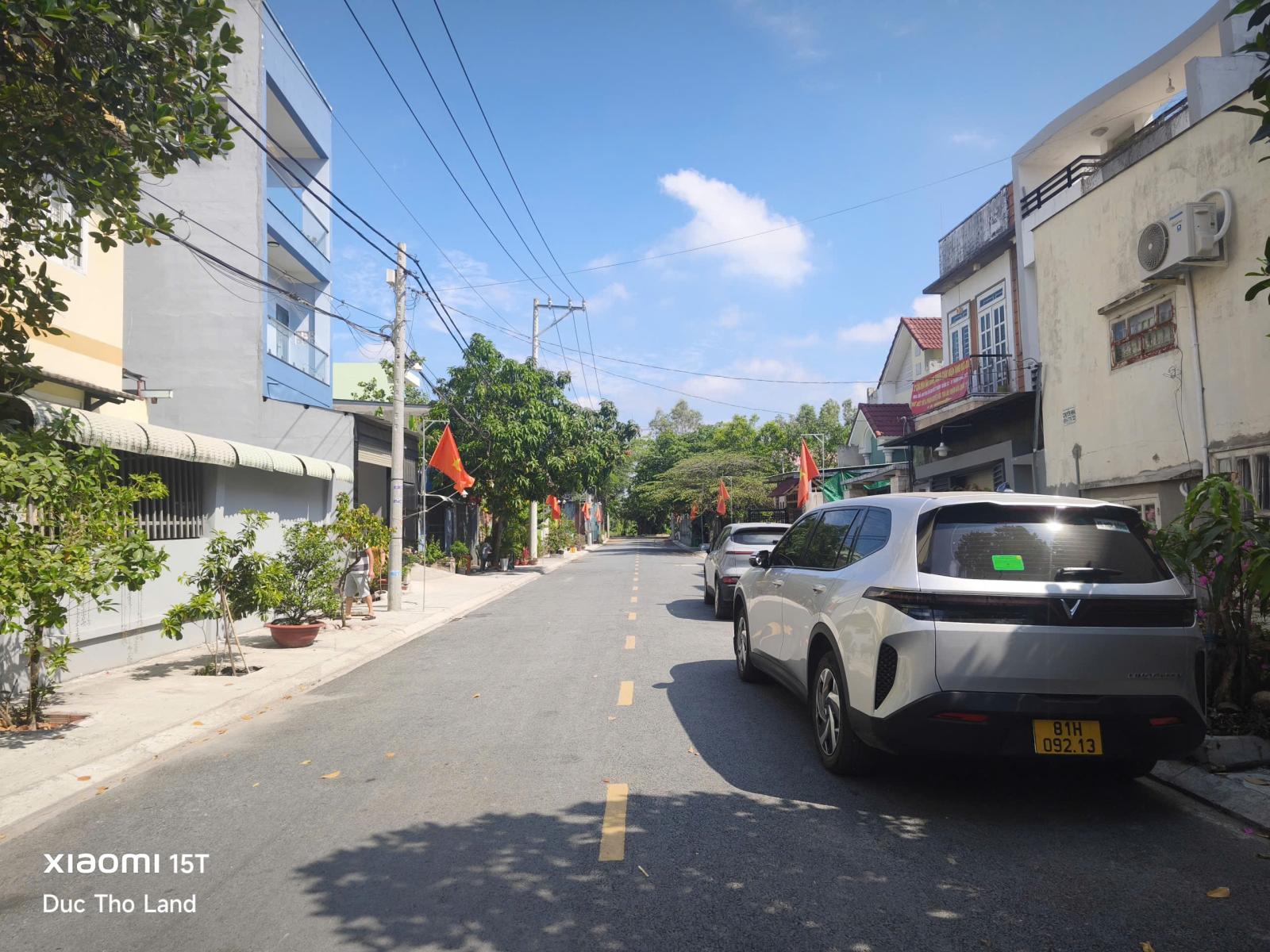 Bán lô đất đẹp đường nhựa 12m TX52 cạnh Sông mát mẻ, 5x23m full thổ cư giá 50tr/m2 15988149