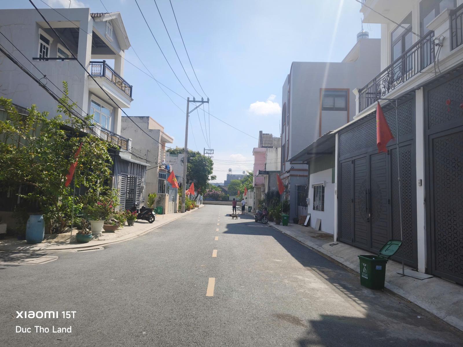 Bán lô đất đẹp đường nhựa 12m TX52 cạnh Sông mát mẻ, 5x23m full thổ cư giá 50tr/m2 15988149