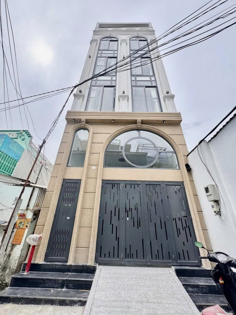 Bán tòa Nhà 6 Tầng -  Hẻm 6m Dương Quảng Hàm - 5x30m, 20 Homestay, HĐT 100Tr, 21 Tỷ. 16008234