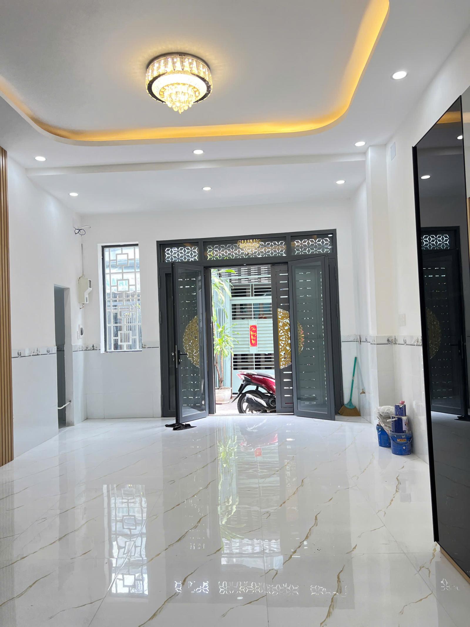 Nhà mới 4 tầng cách mặt tiền 1 căn Bông Sao P5Q8 16011749