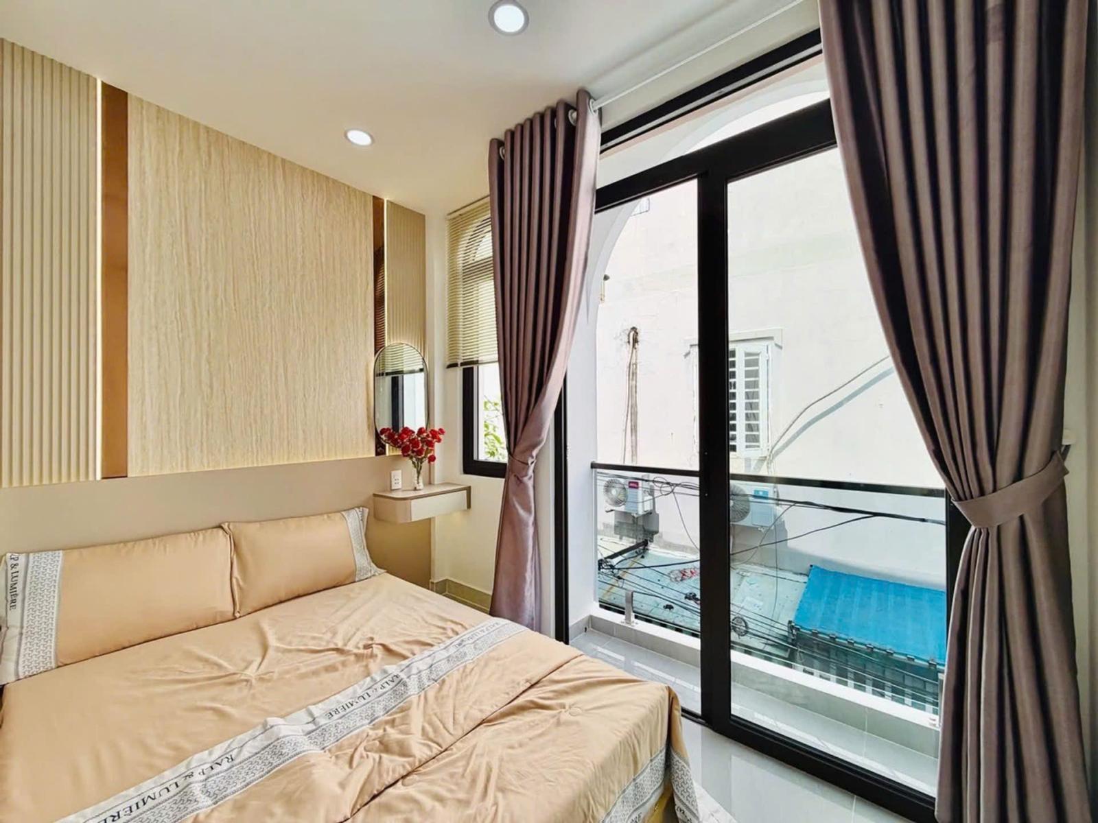 Bán nhà Thống Nhất Gò Vấp 21m2 nở hậu 5m sát hẻm xe hơi giá 3.17tỷ 16015670