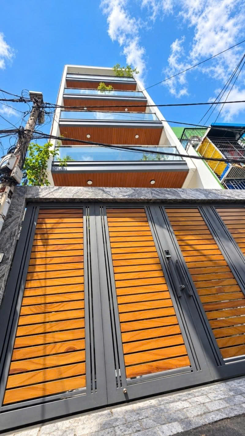 Bán nhà HXH 7m Lê Quang Định - 400m ra Phạm Văn Đồng, 5,5x22m, 6 Tầng -8PN, 19,3 Tỷ. 16018315