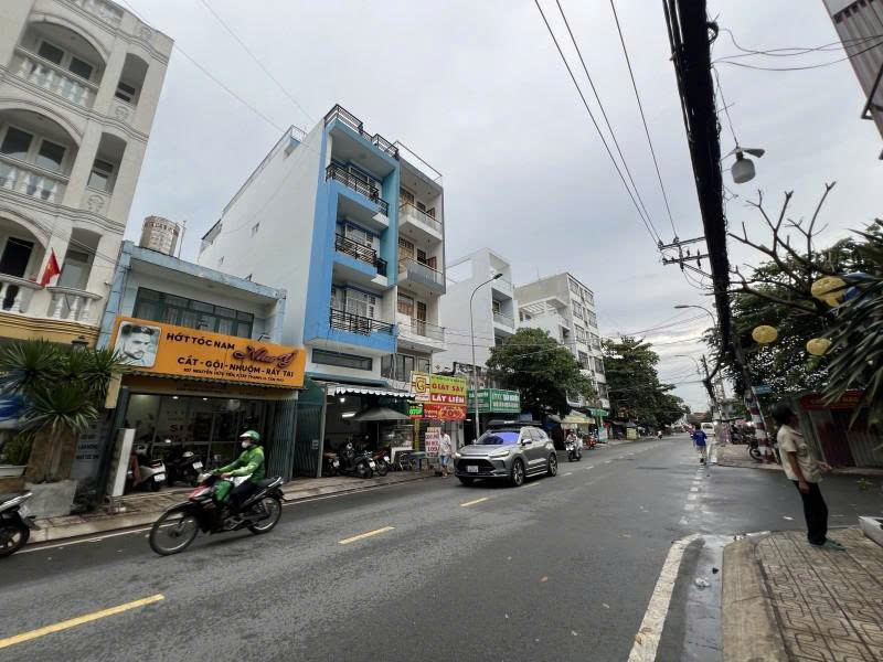 Bán nhà Cấp 4 -  Mặt tiền Nguyễn Hữu Tiến - giao Tây Thạnh, 6,1x30m,  GPXD 8 tầng, 21,9 tỷ 16022055