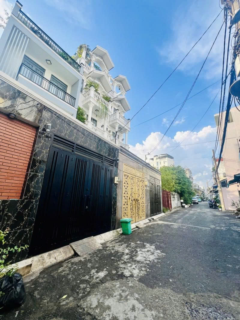 Bán nhà Hẻm xe hơi 5m  Đồng Đen - khu Bàu Cát,  DT: 5x12m, 2 Tầng - Sổ A4, 1 Chủ, 6,7 Tỷ. 16023864